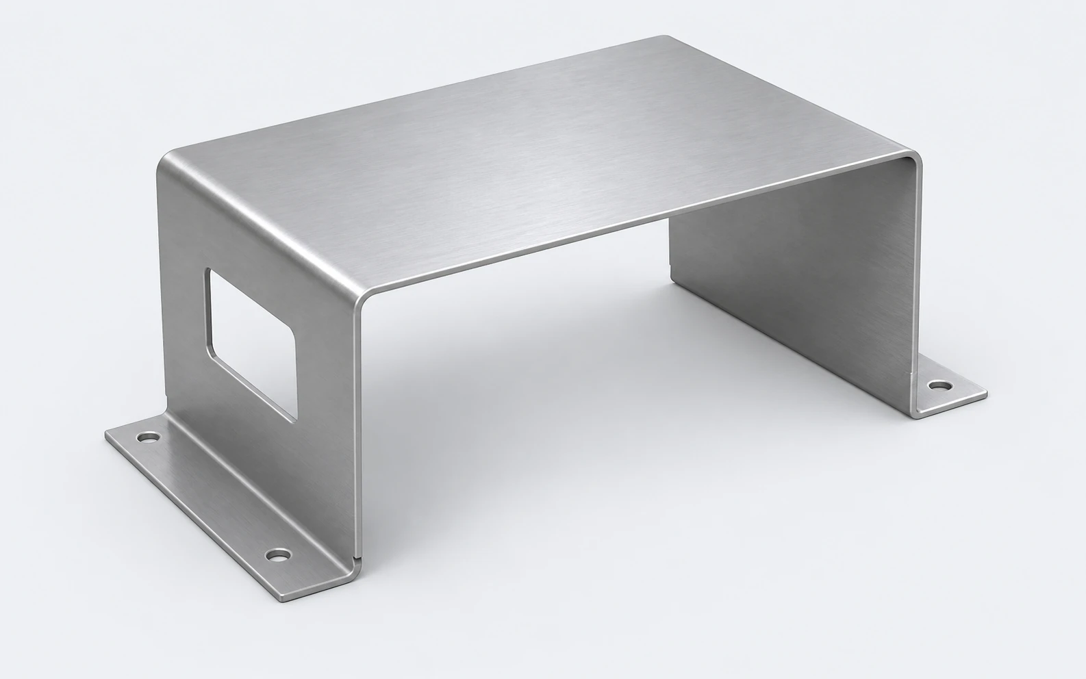 Illustration of a thin folded machine cover with an open underside, service opening and mounting feet.