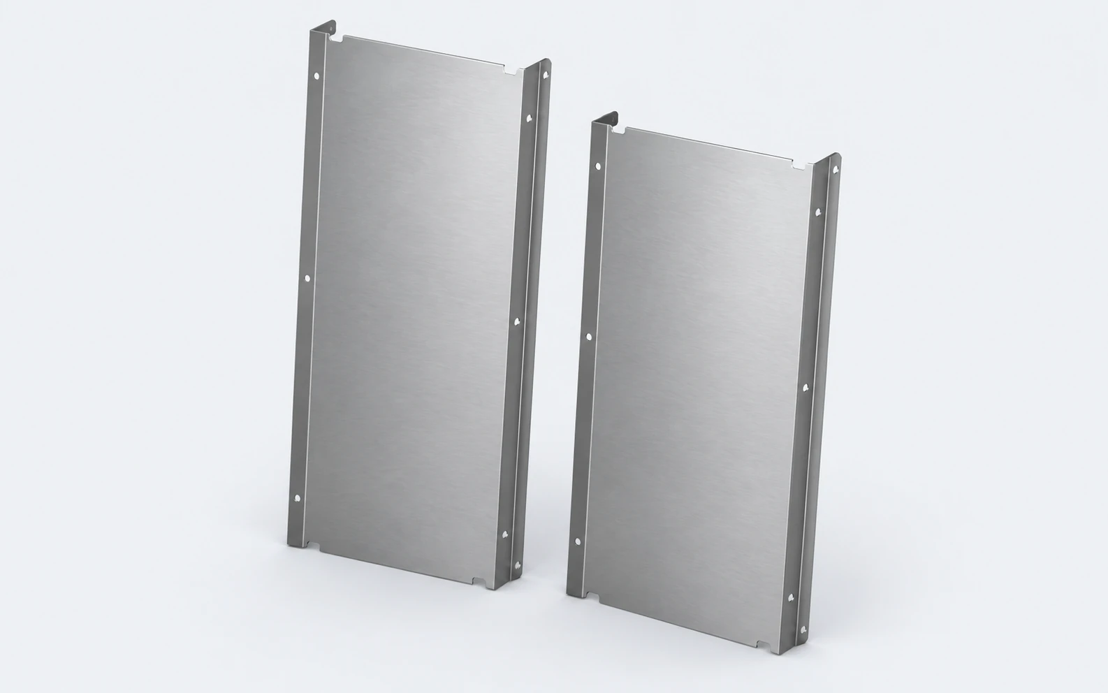 Illustration of two enclosure panels with long return flanges and mounting holes.