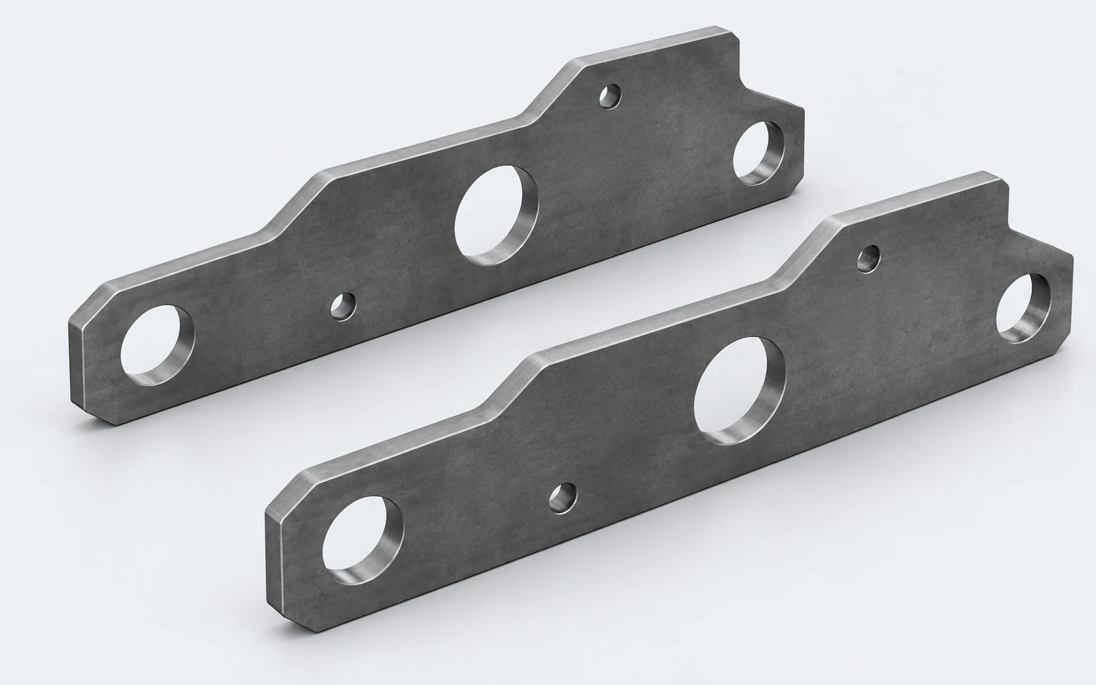 Illustration of two thick profiled steel sideplates with circular assembly openings.